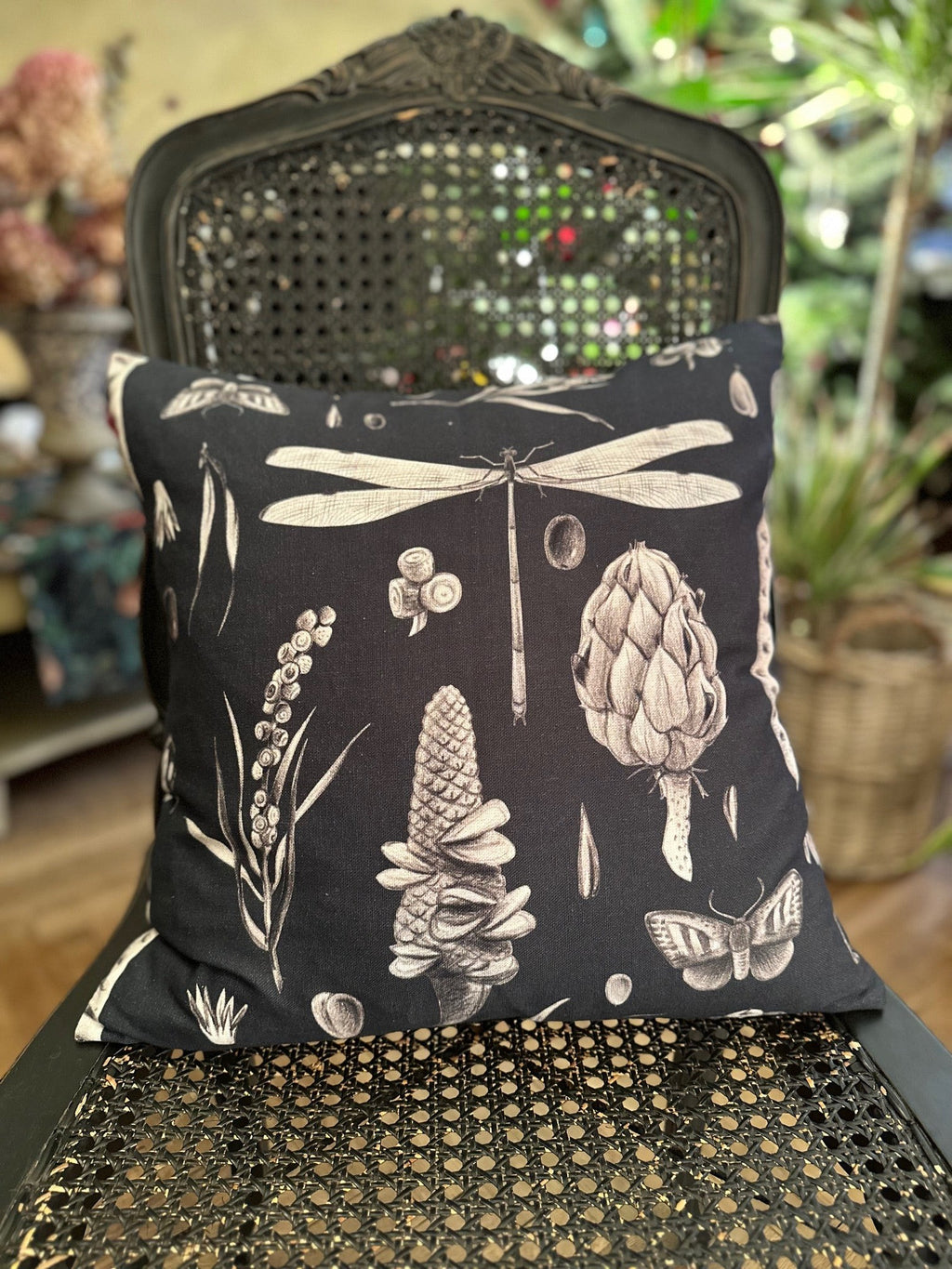 a soft cotton pillowcase with the seeds carbon print resting on a cozy bed