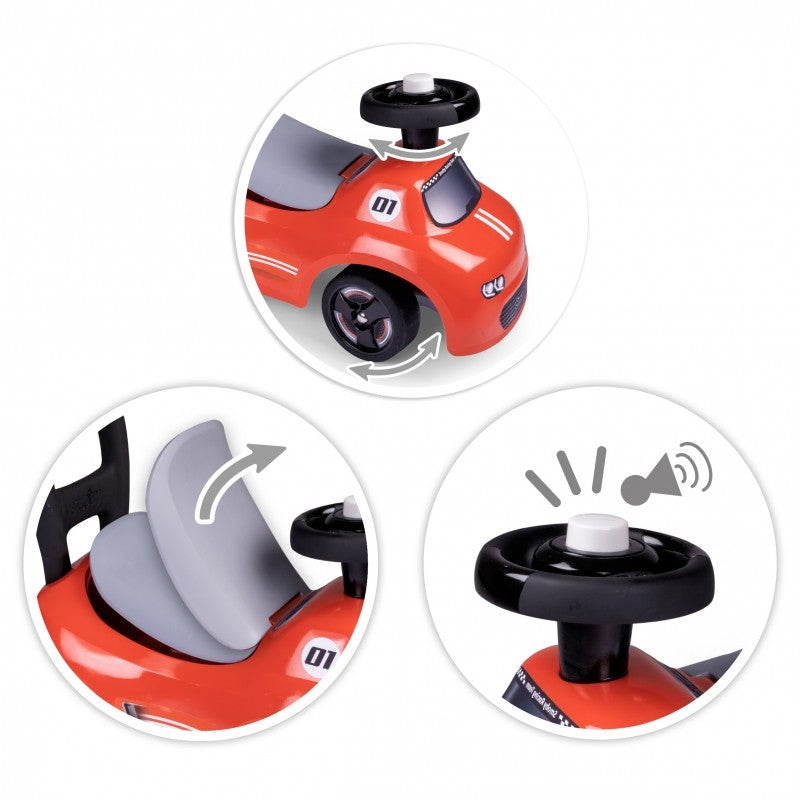 close-up of the smoby red ride-on car's mechanical horn and ergonomic handle