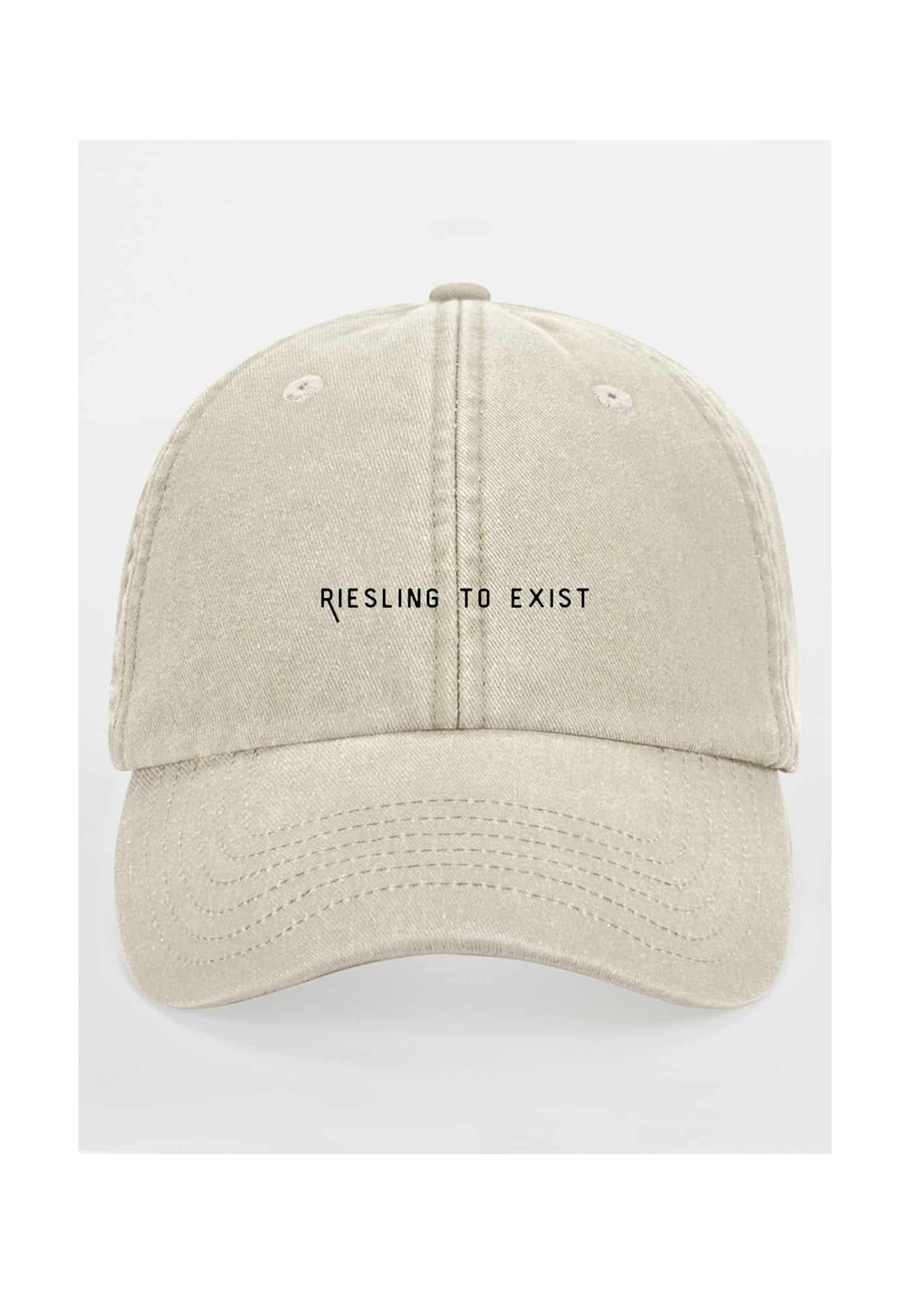 a bold close-up of the riesling to exist cap with sharp embroidery detail