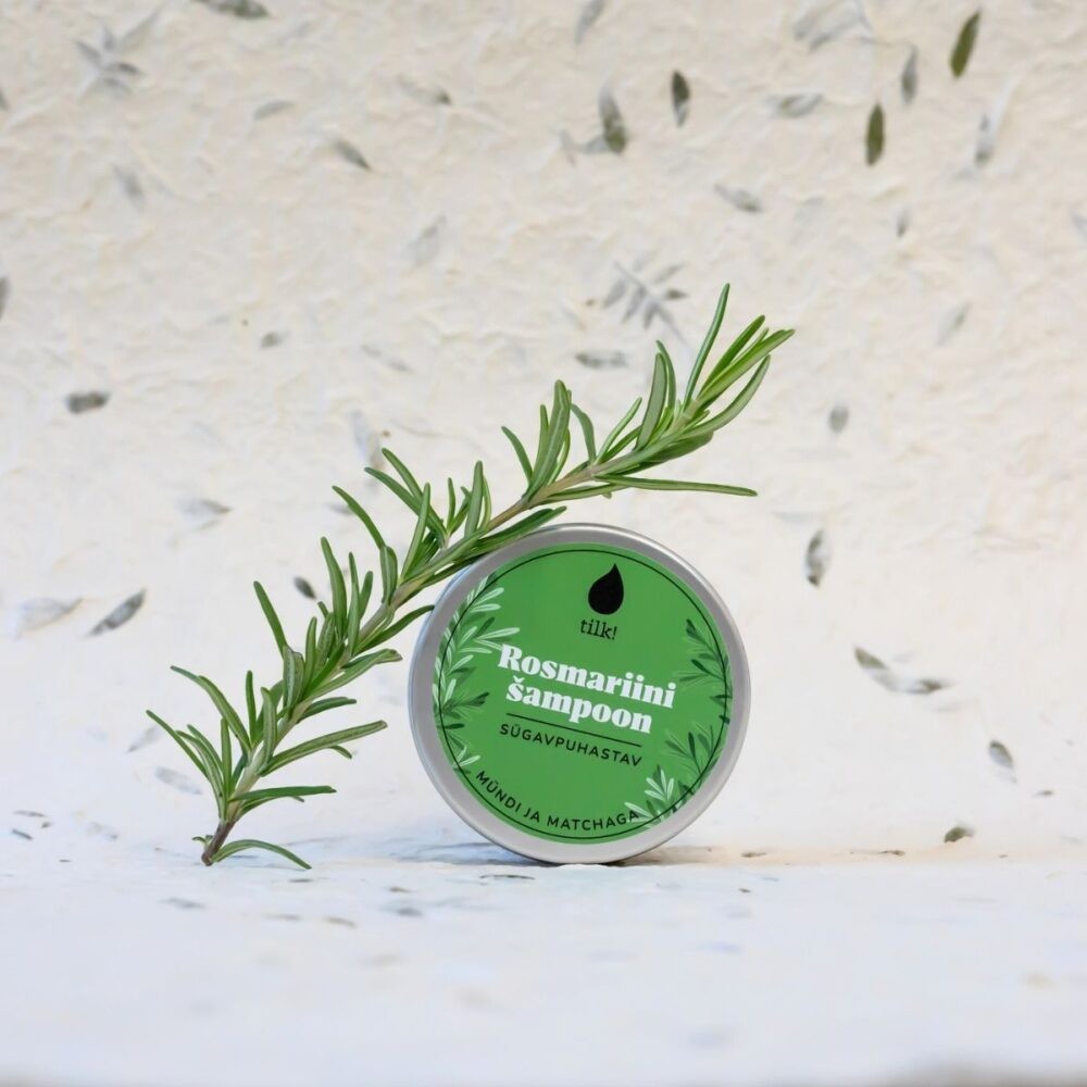 a soft-focus shot of the vegan matcha shampoo bar resting on a natural linen cloth, evoking a comforting and gentle hair care ritual