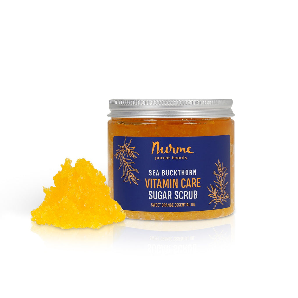 close-up of sea buckthorn and orange sugar scrub with soft morning light