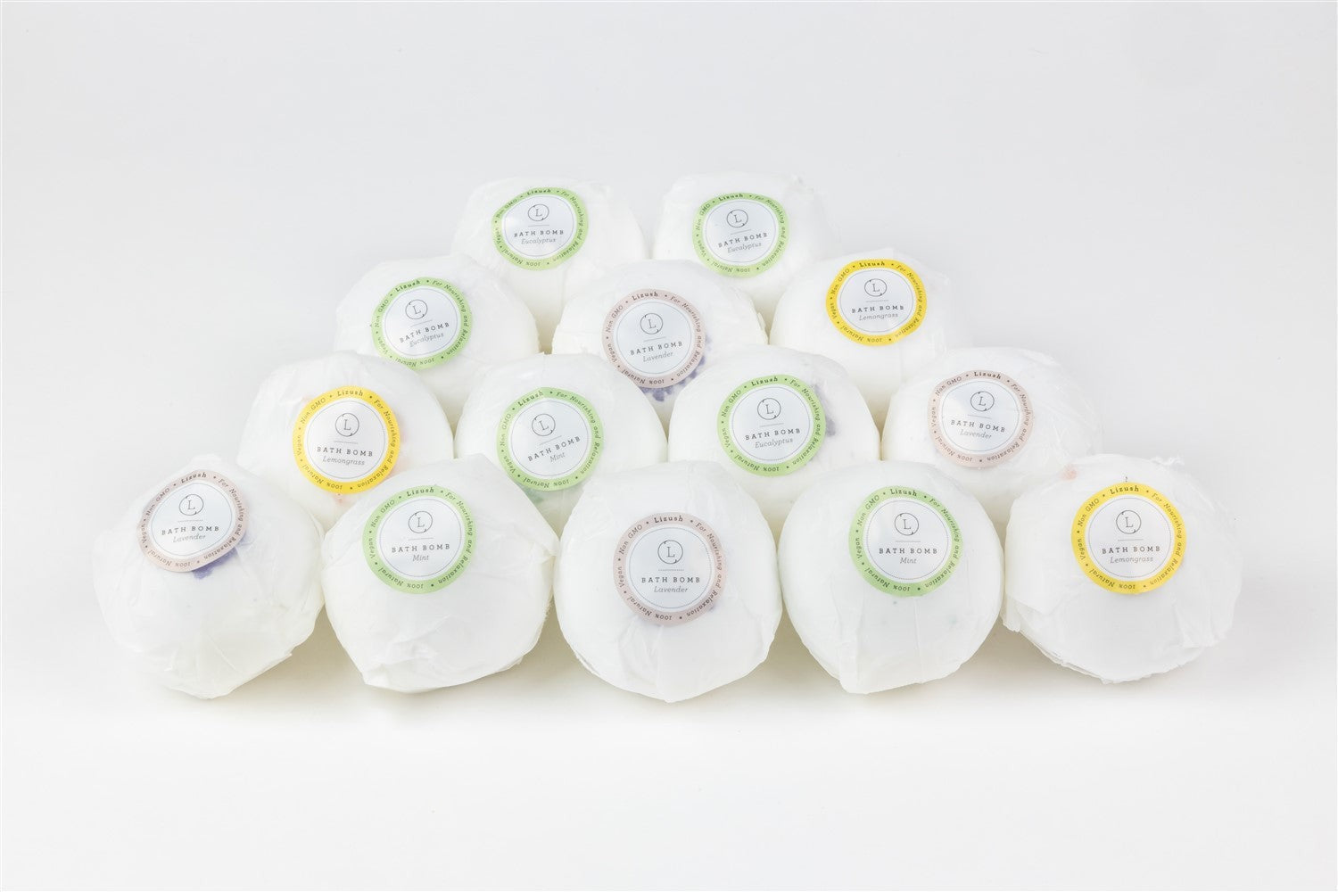 a playful spa gift set with a cute teddy bear peeking from a box of bath bombs and cocoa