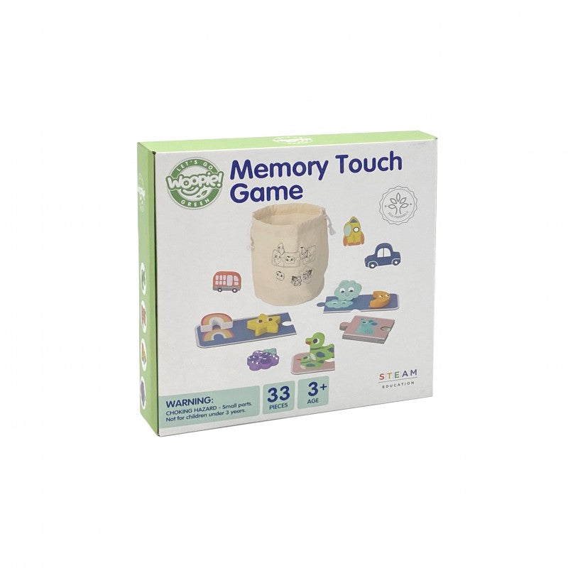 a child's hands playing with the woopie green sensory puzzle tiles, laughing with excitement