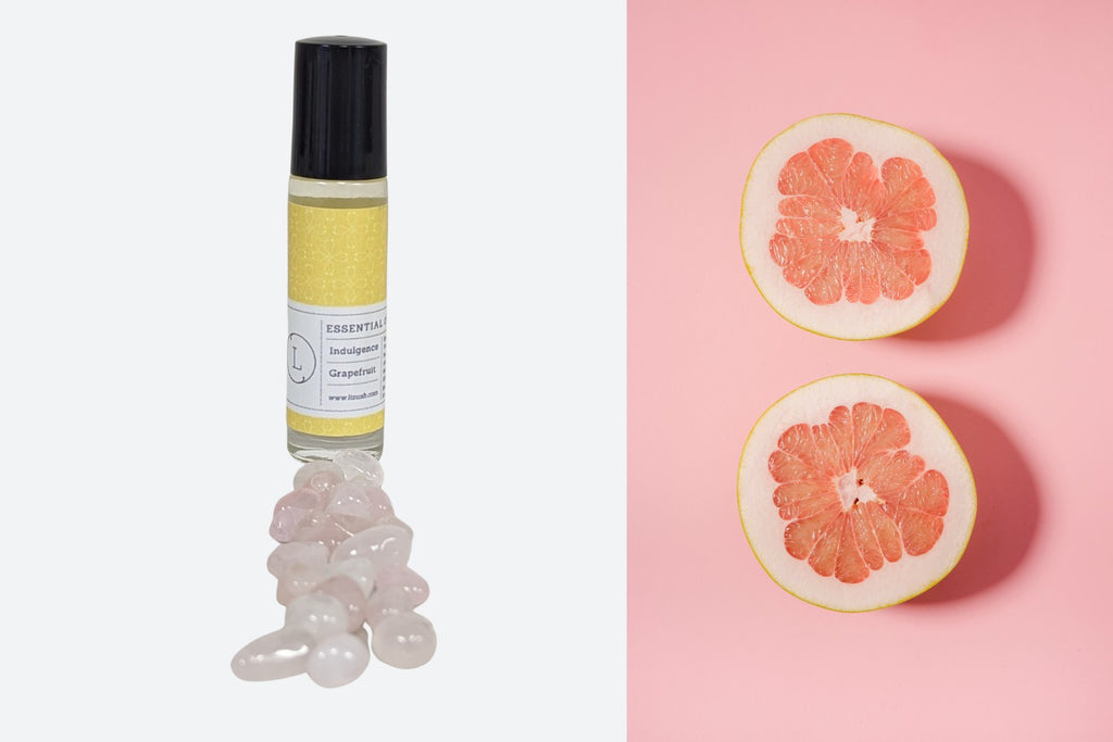 practical set of 5 crystal-infused essential oil roll-ons in a white gift box for daily wellness
