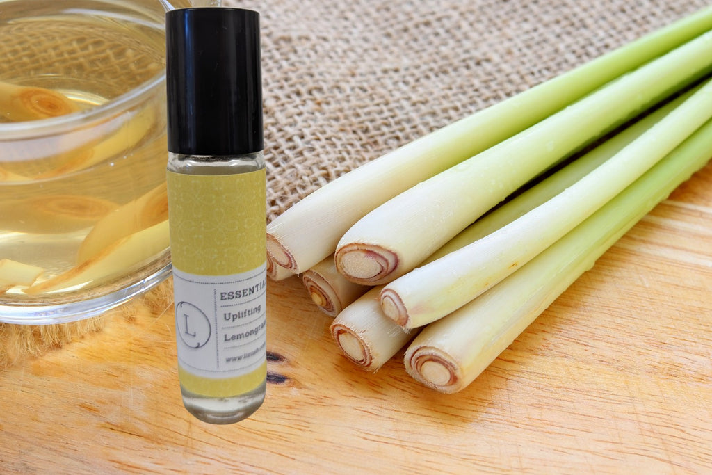 five crystal-infused essential oil roll-ons in a gift box, a thoughtful present for self-care
