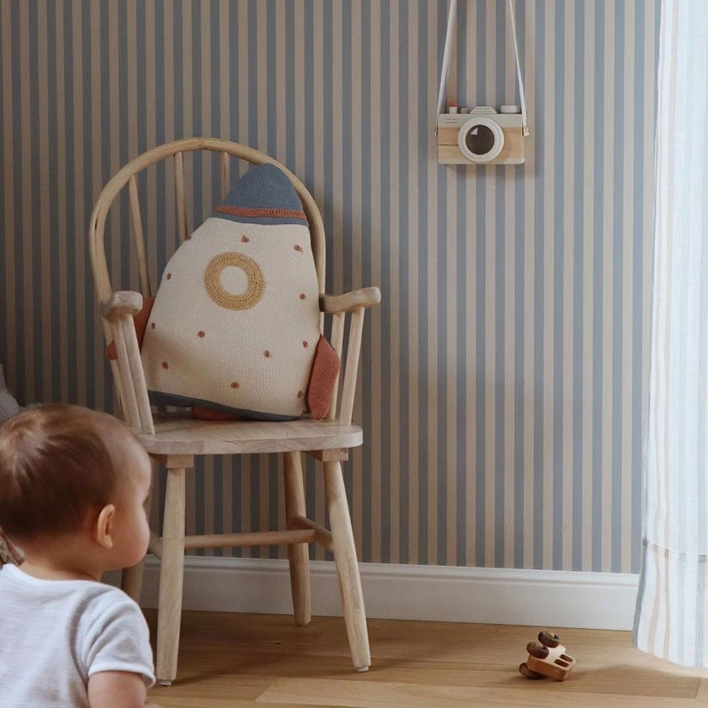 bold close-up of charming beige and blue vintage stripe wallpaper with confident artisan texture