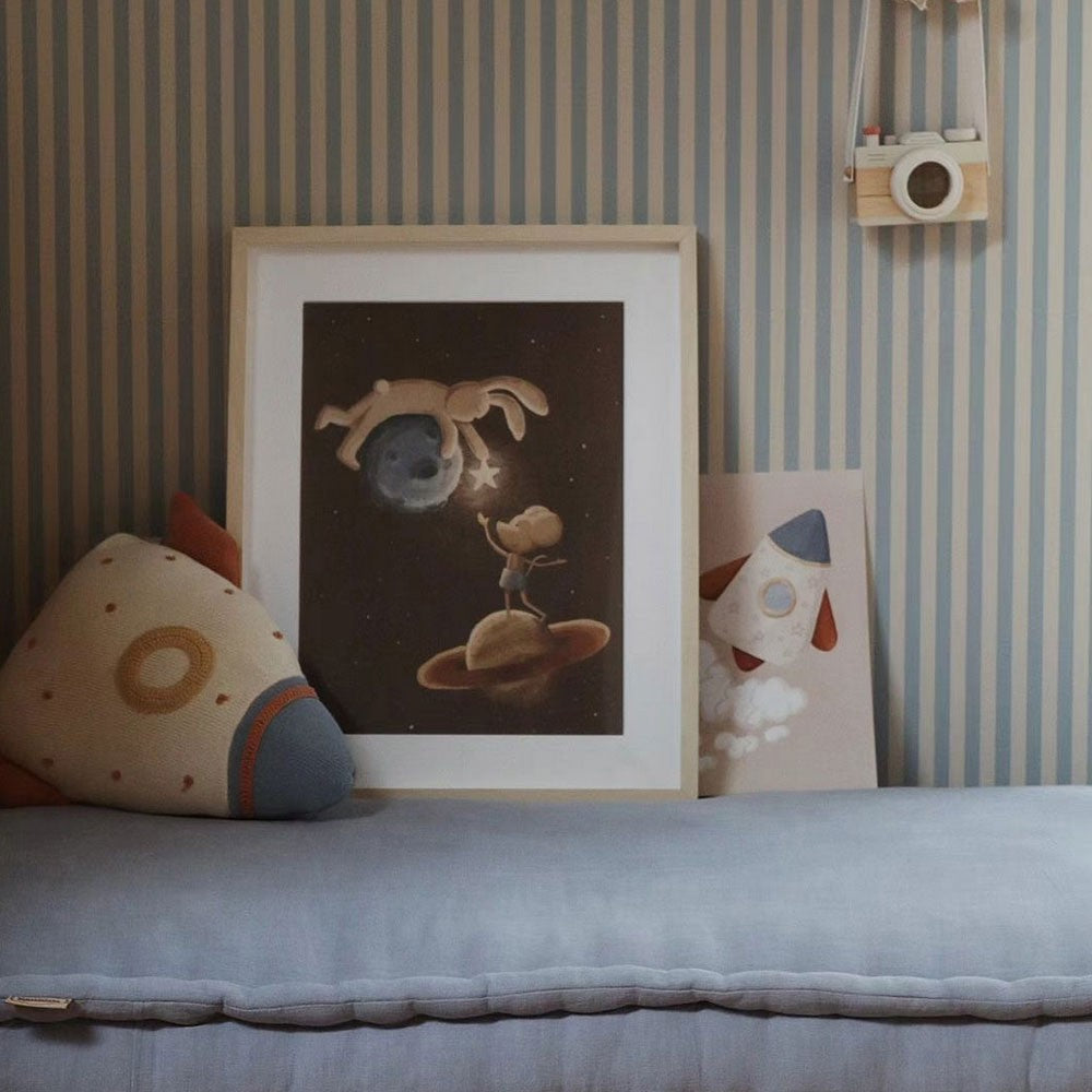 playful beige and blue vintage stripe wallpaper in a bright, sunlit kids room