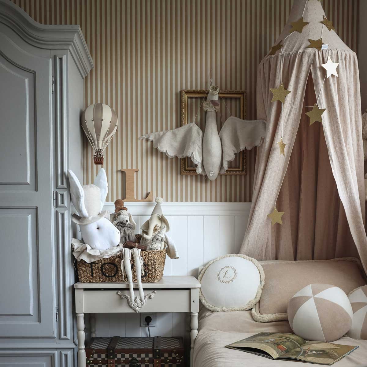 close-up detail of beige and brown vintage stripe wallpaper showing its matte paper texture and easy-to-match pattern