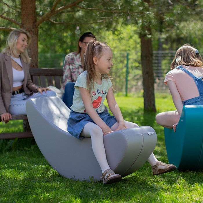 bold grey banana rocker toy on a bright background, ready for active play