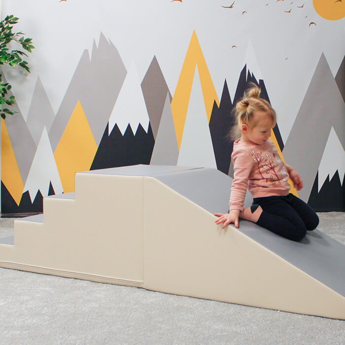 elegant beige and grey soft play step and slide set for toddlers, showcasing durable eco-leather and sleek design