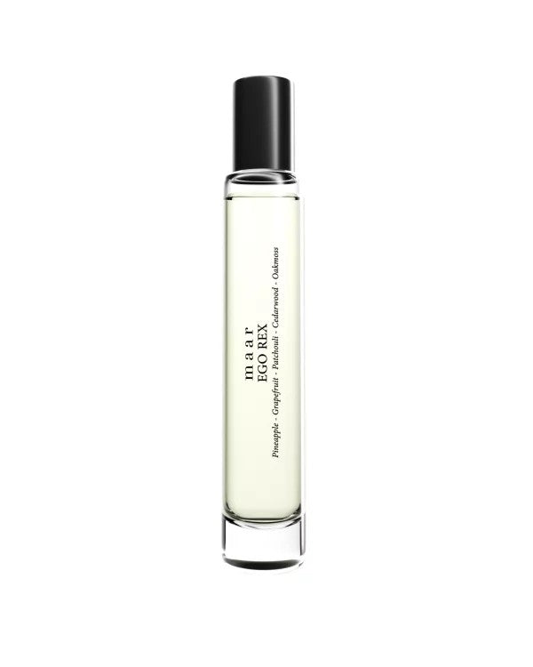 soft morning light on ego rex perfume bottle with citrus and blossom notes
