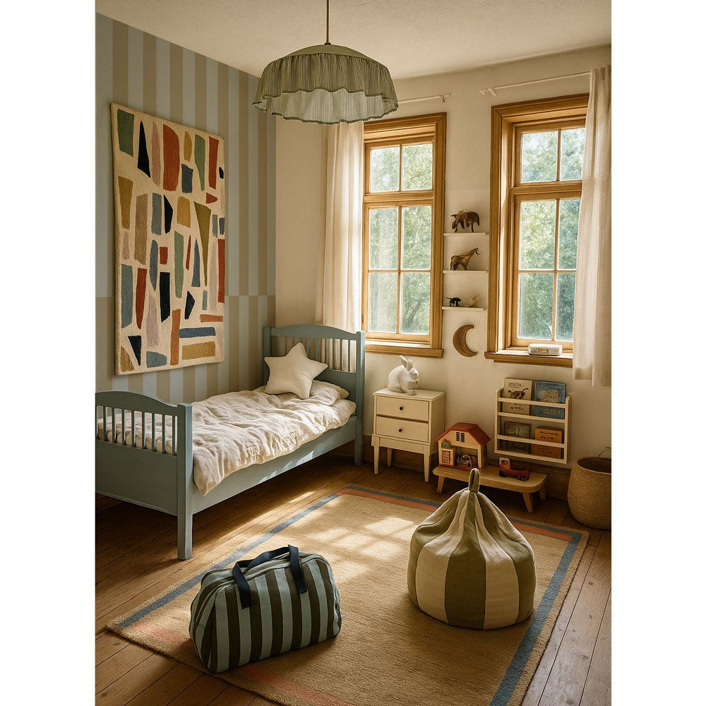 soft blue-green and cappuccino striped wallpaper in a serene nursery setting