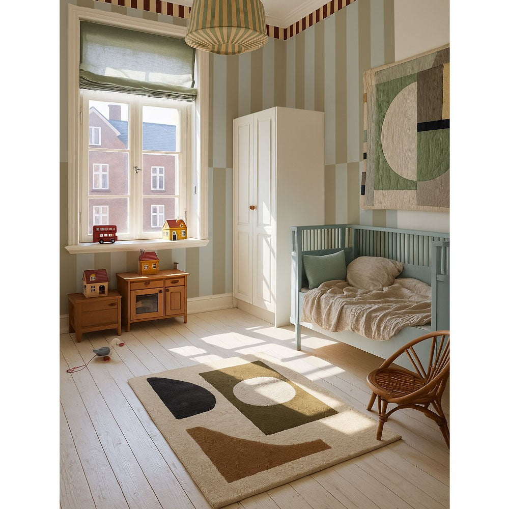 bold blue-green upside down wallpaper stripes creating a dramatic paneled wall effect