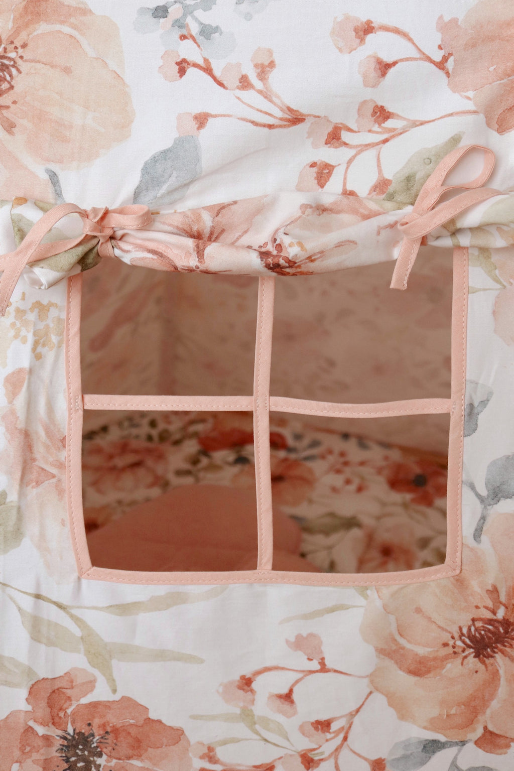 bold floral kids teepee tent with hand-painted artistry and sturdy pine poles