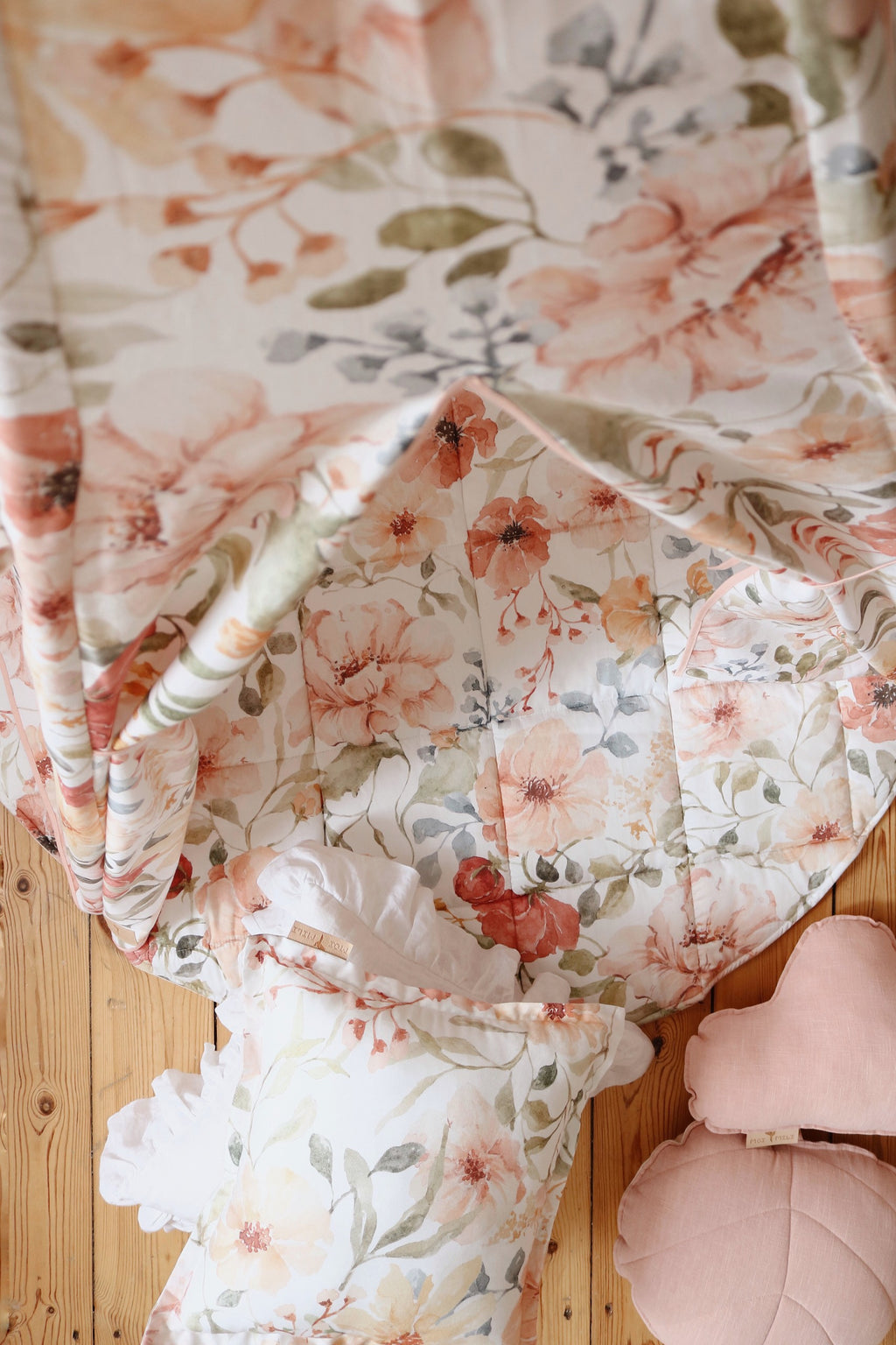elegant handmade kids teepee tent with floral patterns in a sunlit garden setting