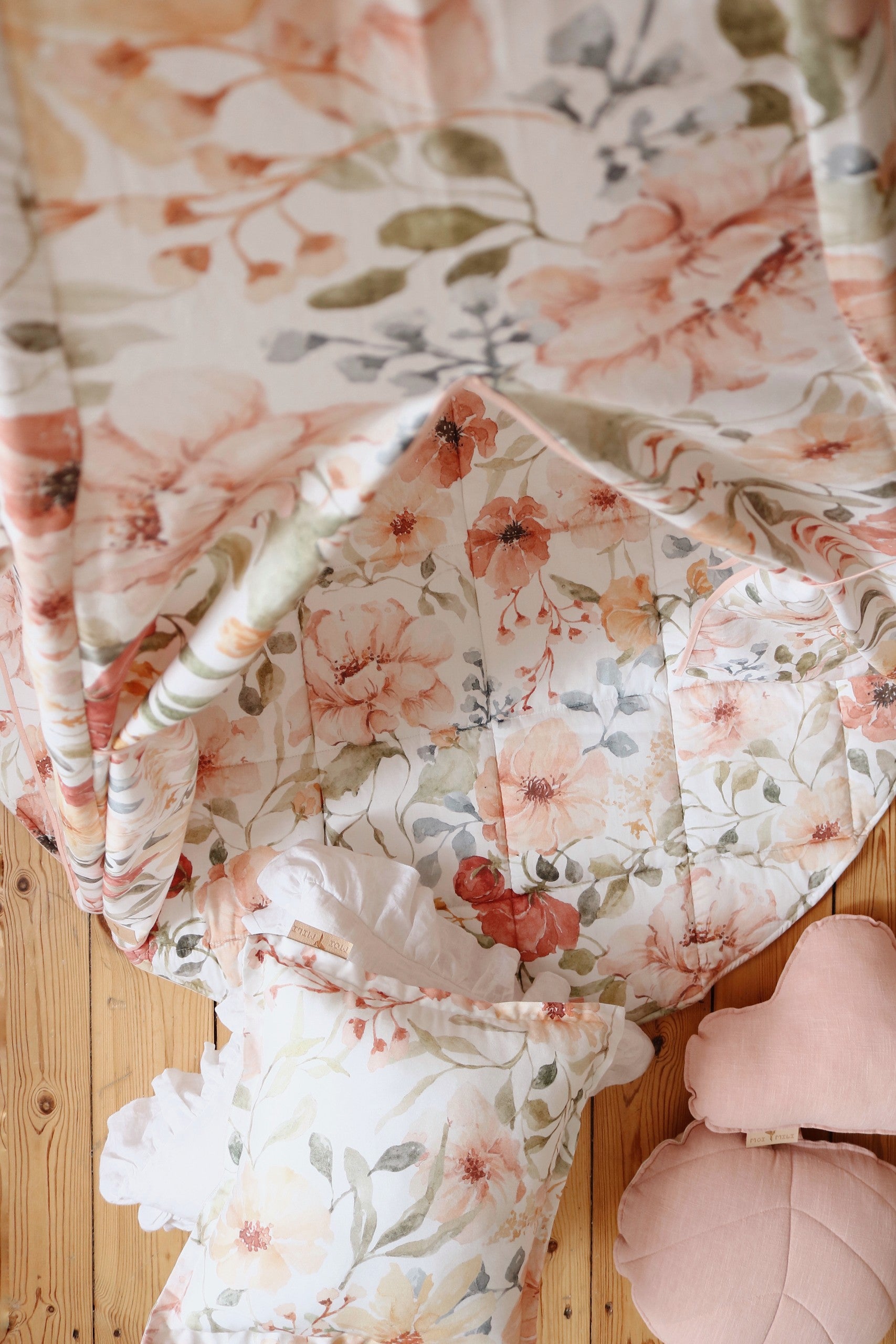 elegant handmade kids teepee tent with floral patterns in a sunlit garden setting