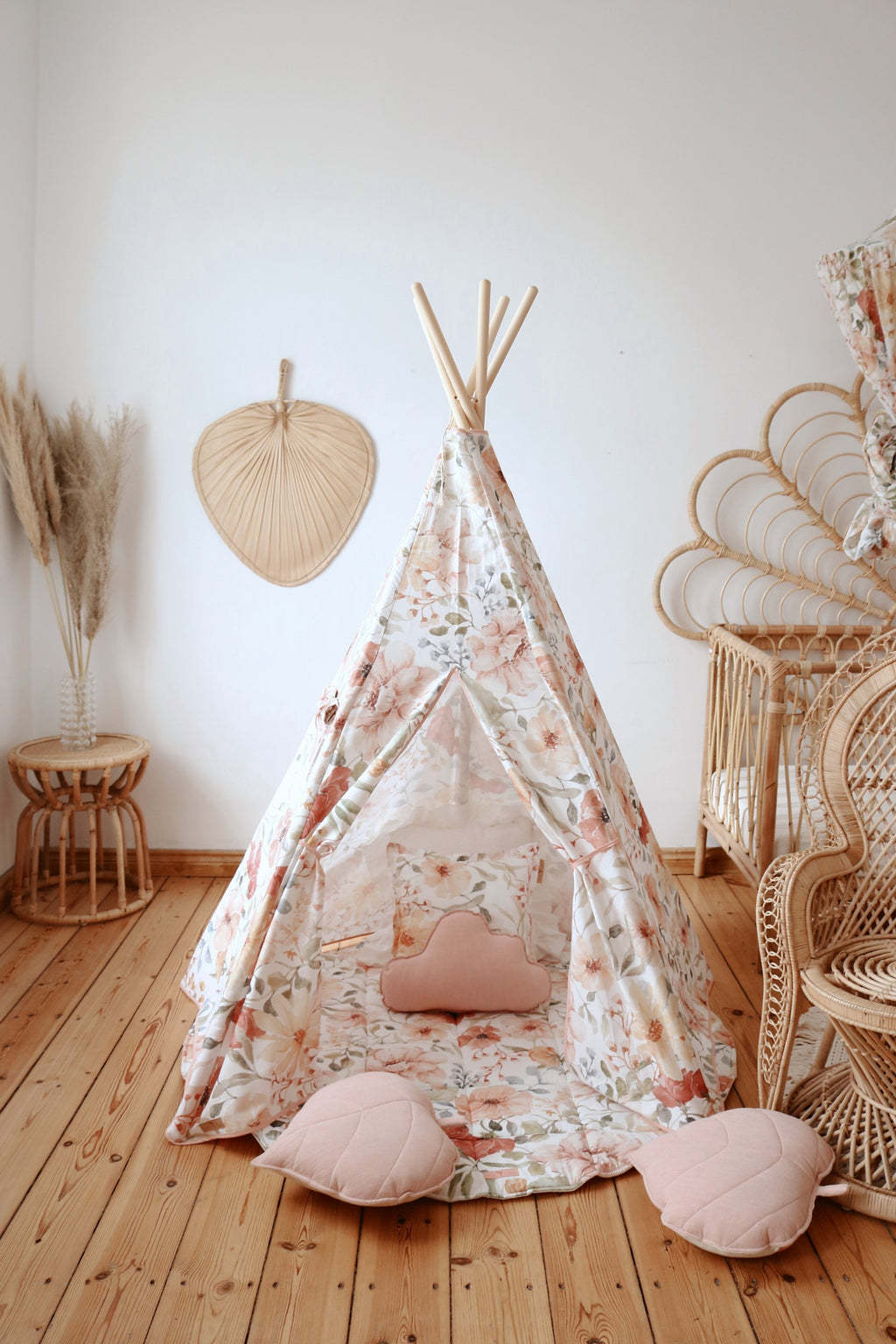 close-up detail of the flower power teepee's sturdy pine pole connection and cotton fabric tunnel