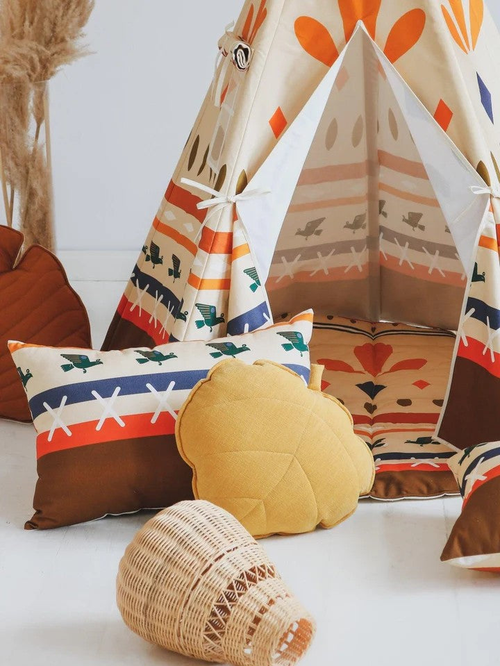 kids giggling inside a colorful cotton teepee tent during a playful indoor adventure