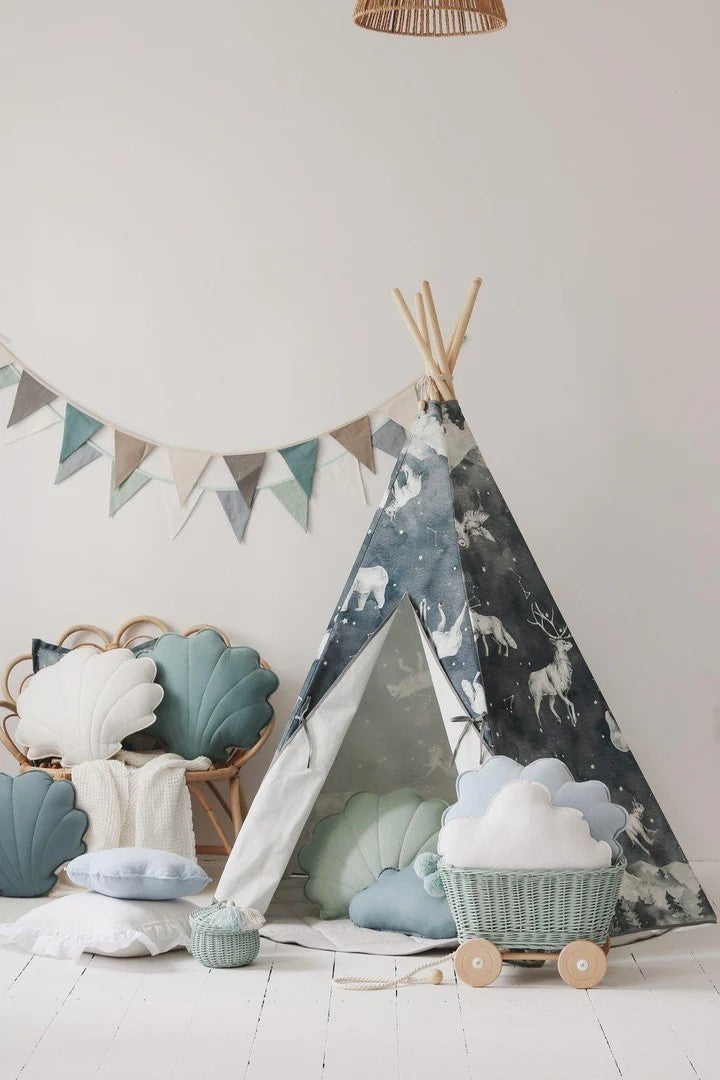 bold night sky teepee tent with starry animal pattern and pine poles standing confidently