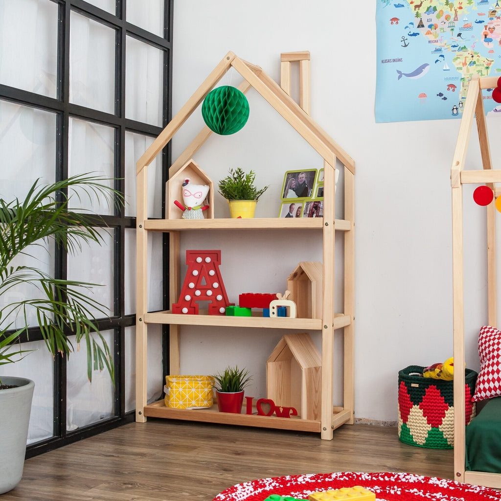 close-up of a functional house-shaped kids shelf with sturdy 3x4cm wood profile