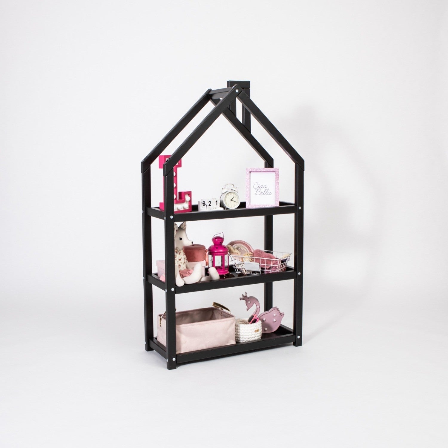 a grey house-shaped kids shelf in a cozy nursery corner with soft morning light
