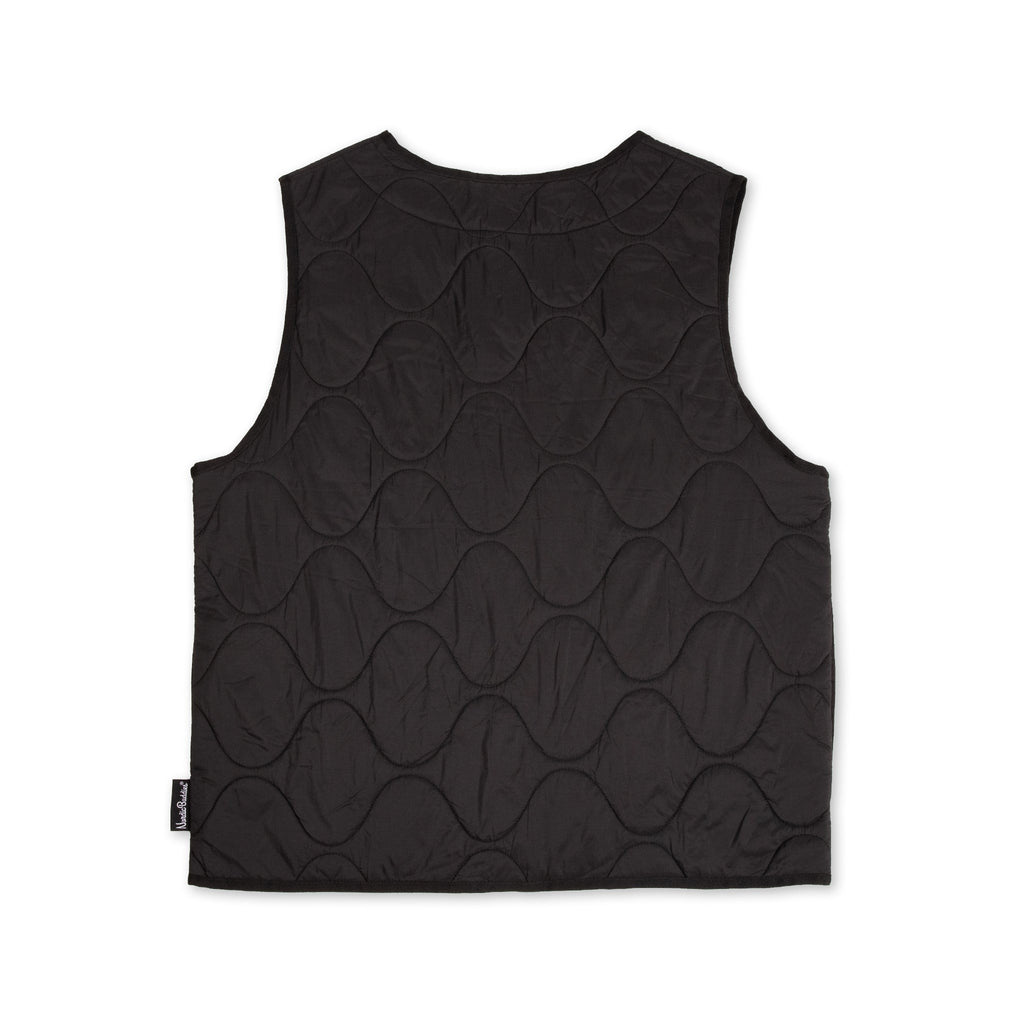 close-up detail of the durable nylon fabric and a functional pocket on the black snufkin fishing vest