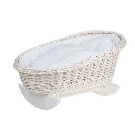 playful wicker doll cradle with white bedding, ready for a teddy bear to be tucked in