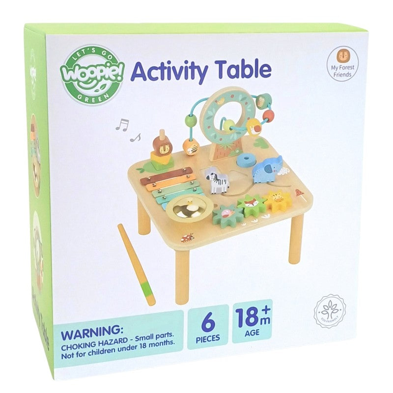 a toddler's hand guiding a colorful ball down the wooden track of a sustainable 5-in-1 activity table