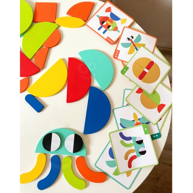 an elegant arrangement of a child's completed wooden montessori butterfly puzzle on a natural wood table