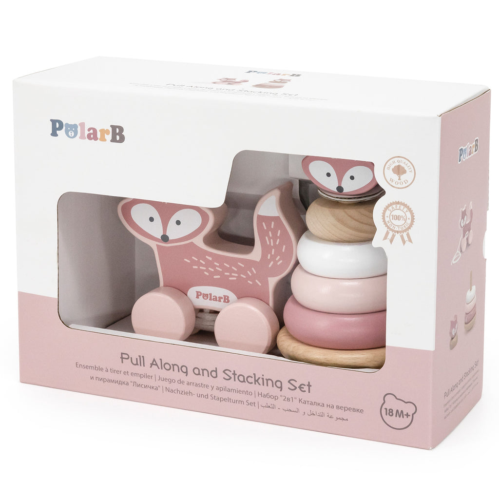 adorable pastel wooden fox pull toy and stacking pyramid for toddlers on a sunny playroom floor