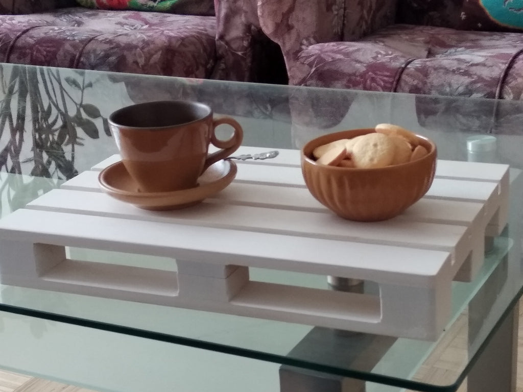 bold estonian wooden tray as a sleek laptop stand on a dark table