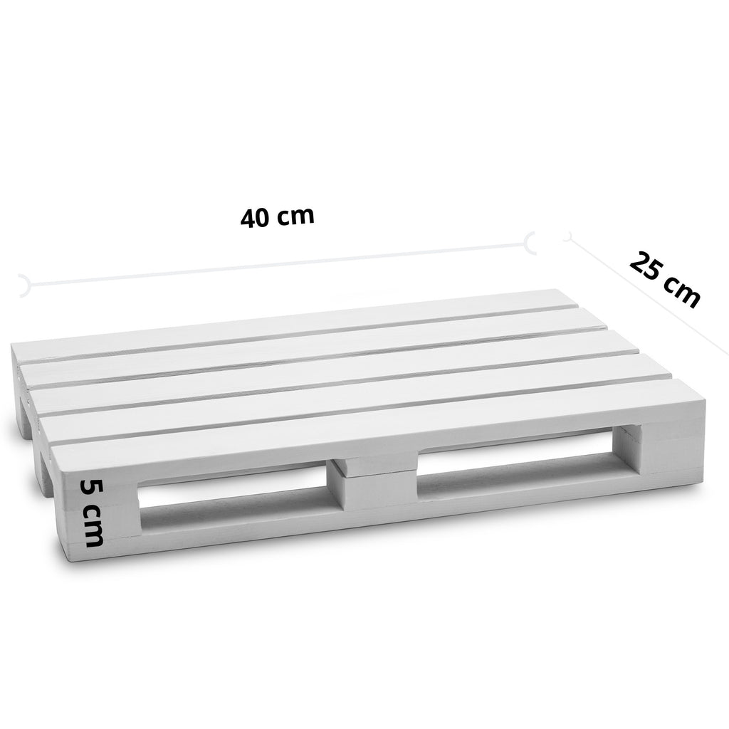 handmade estonian wooden tray used as a practical laptop stand on a bed