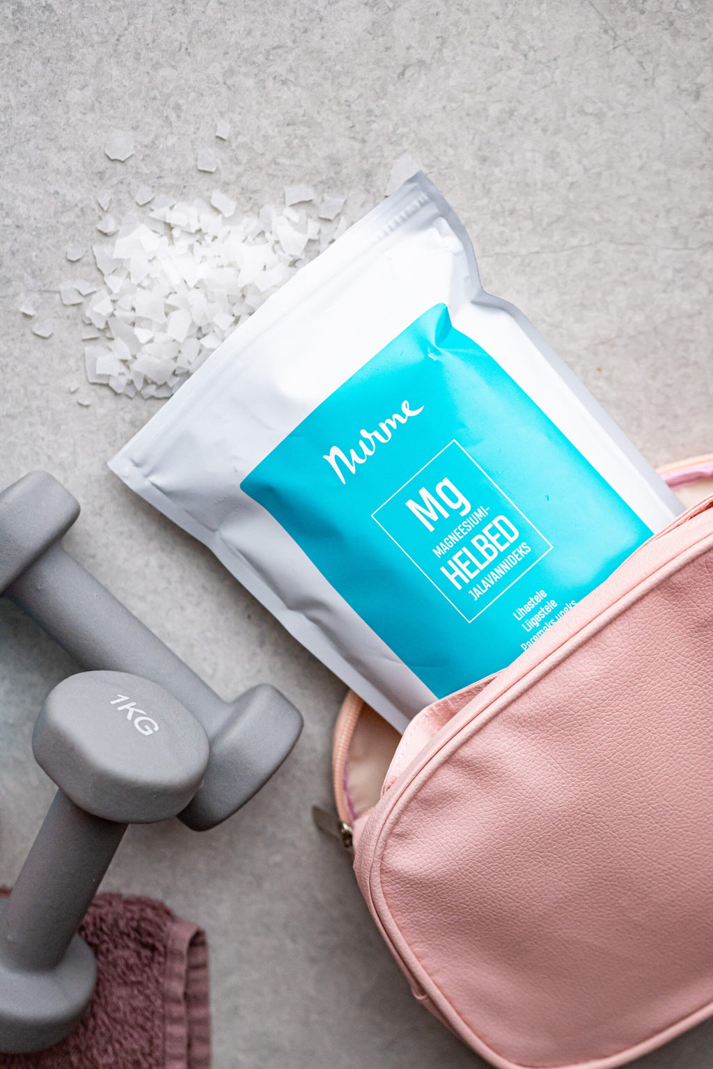 a soft, inviting close-up of pure zechstein magnesium bath flakes in warm, gentle light