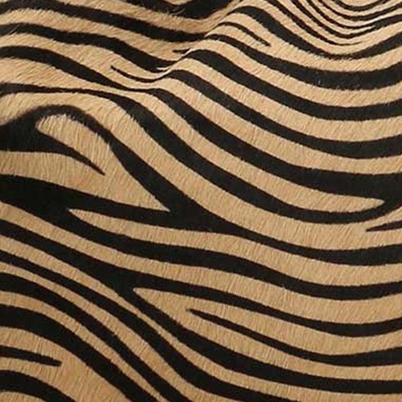 Gold Zebra Print Leather Tassel Bag – Elegant & Versatile by Sostter at brixbailey.com